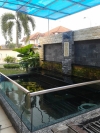 Tempered glass 2' high Koi Pond Design and Build