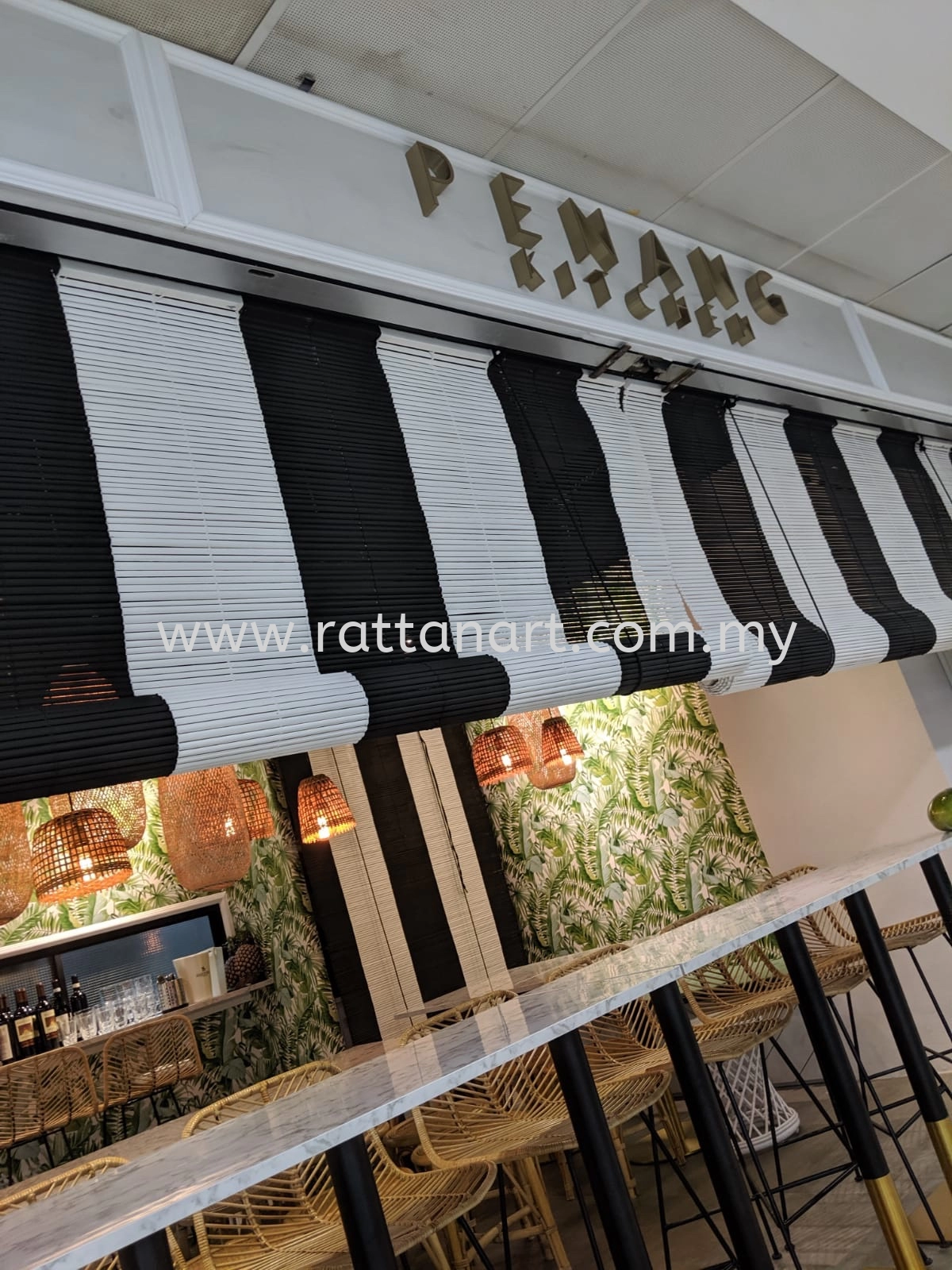 Made In Malaysia.  Production by Rattan Art.  Restaurant Name: Penang Kitchen
