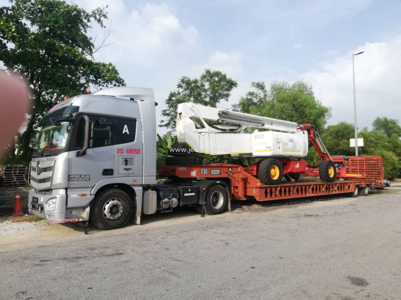 Moving Boom Lift