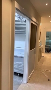 Hanging door with louvres and glass Others