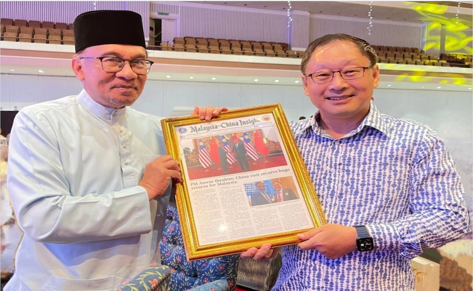 马来西亚首相安华会见PUCM总会长拿督李中平