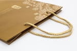 Elegant Inn - Gold Paper Bag Bag - Woven/Non Woven/Paper/Kraft Paper Printing & Packaging