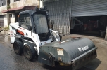 Bobcat Sweeper with Machine Bobcat Rental