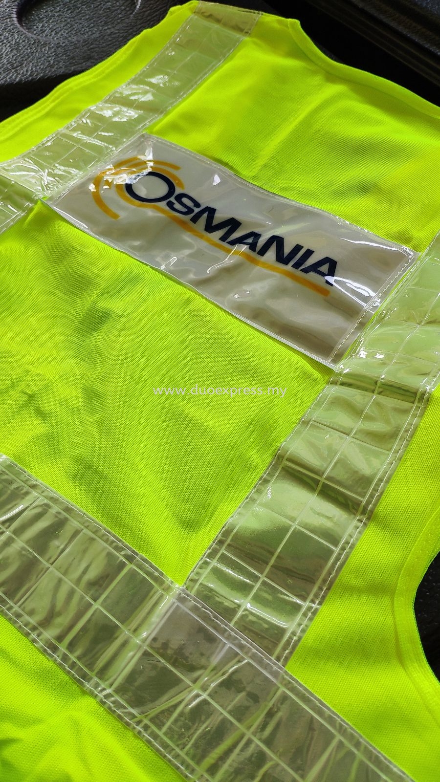 Safety vest with custom reflective logo