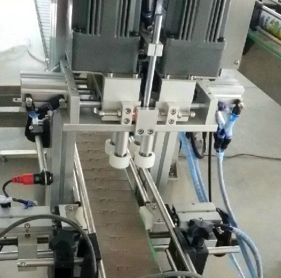 Install capping machine onto conveyor