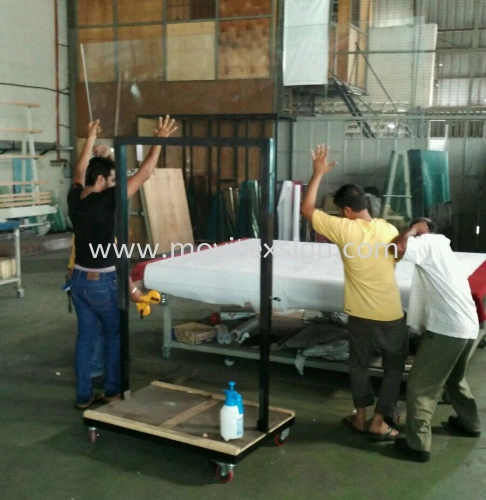 glass Sticker installation in production 