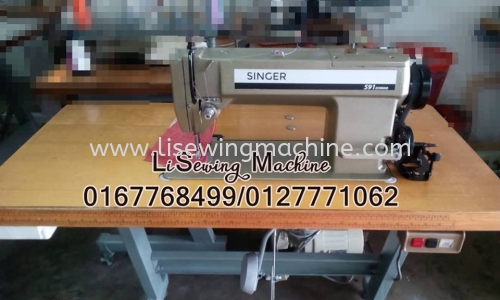 Used Singer sewing machine