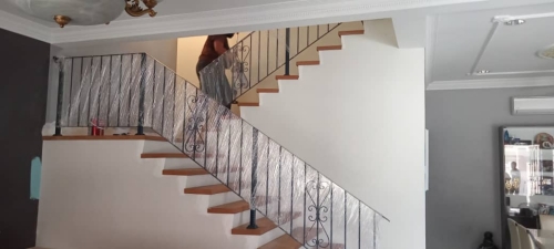 installation wrongth iron handrail staircase 