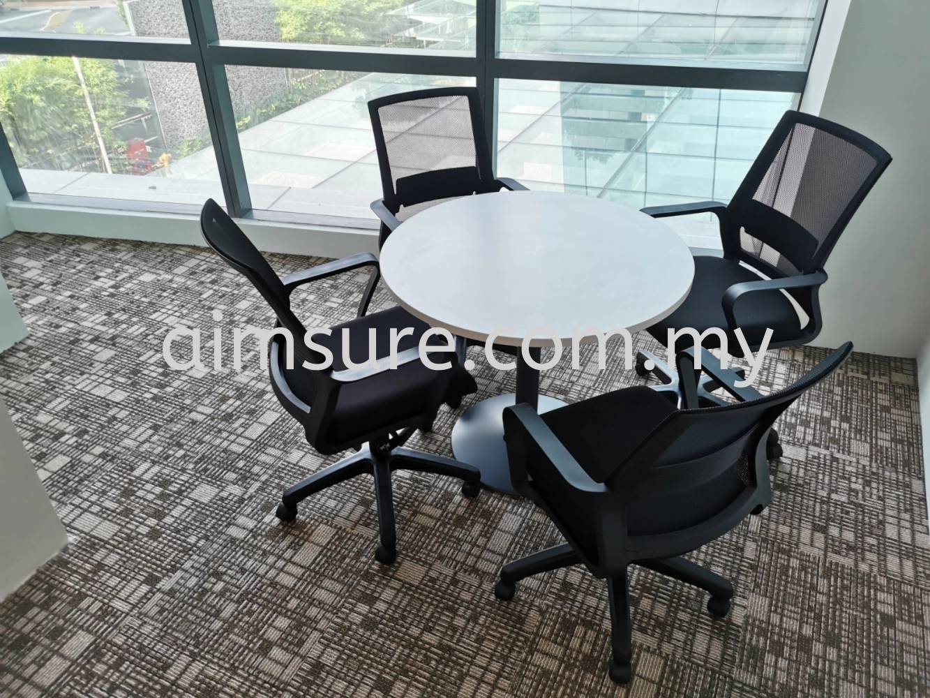 Round table with mesh chair