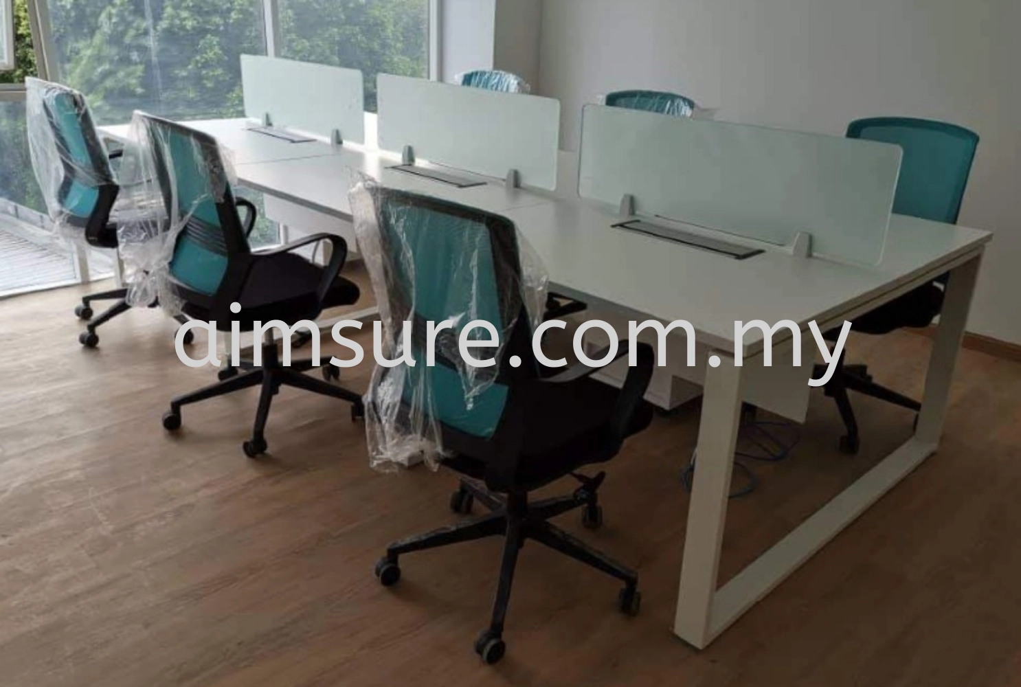 Modern office workstation with tempered glass desking panel