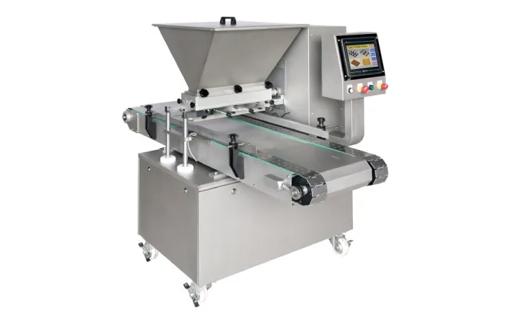 CAKE DEPOSITING MACHINE