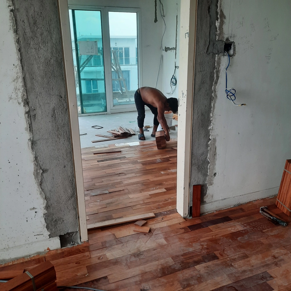 Installation of Wood Veneer Floor at 280 Park Homes