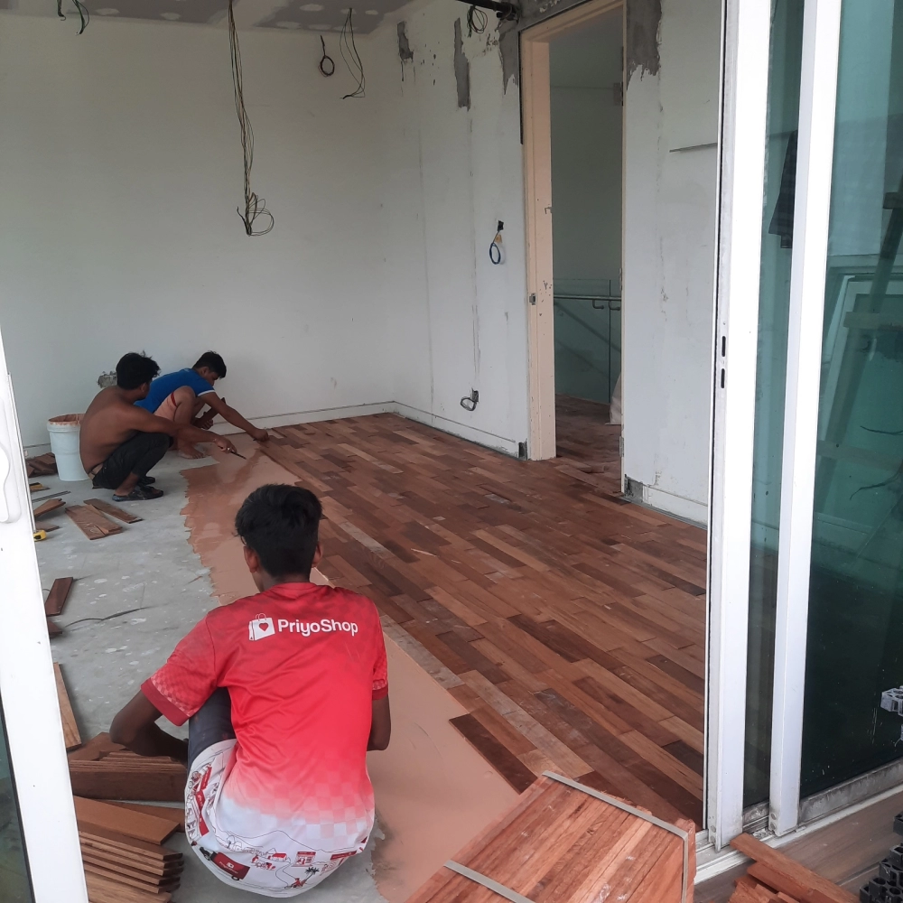 Installation of Wood Veneer Floor at 280 Park Homes