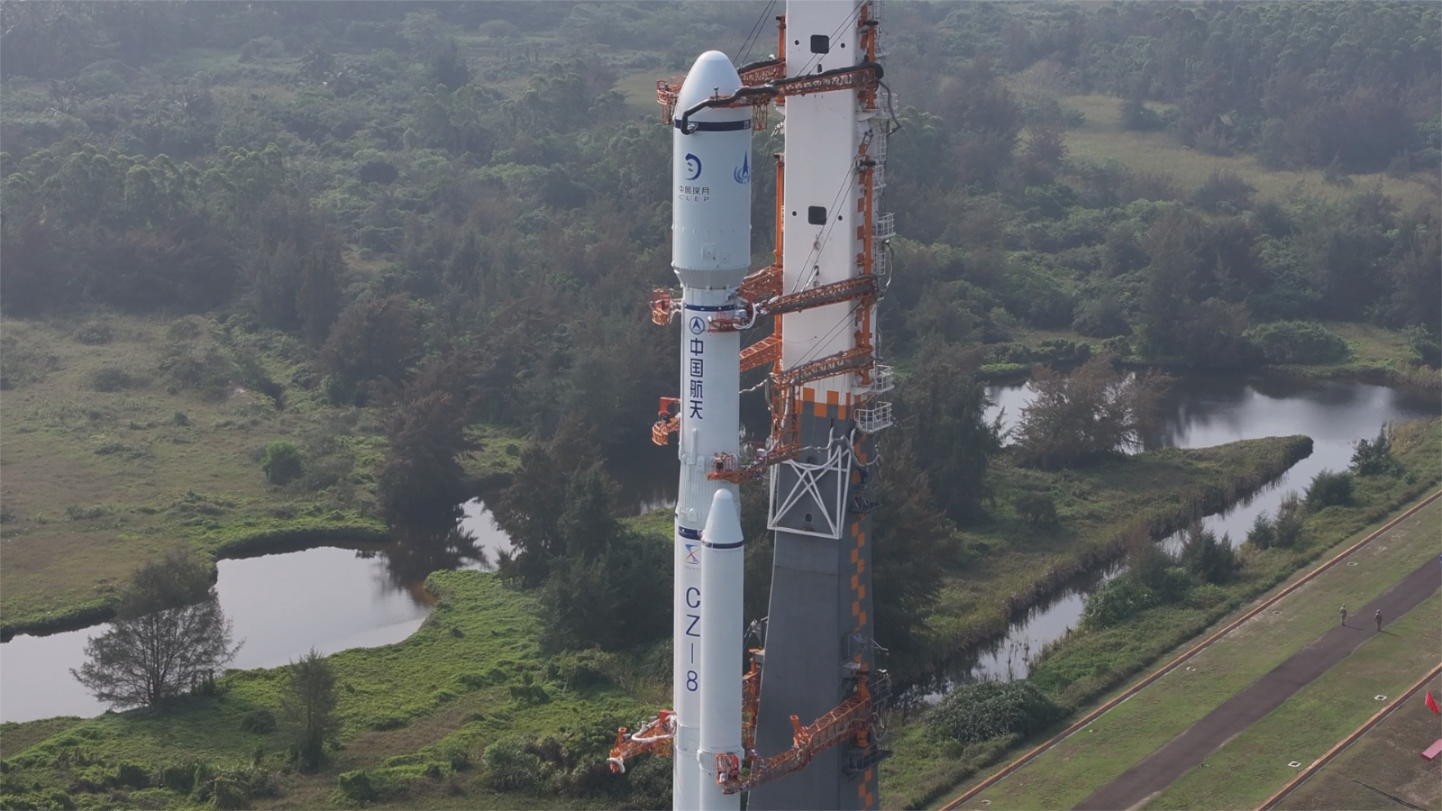 Rocket carrying China's Queqiao-2 satellite transported to launchpad