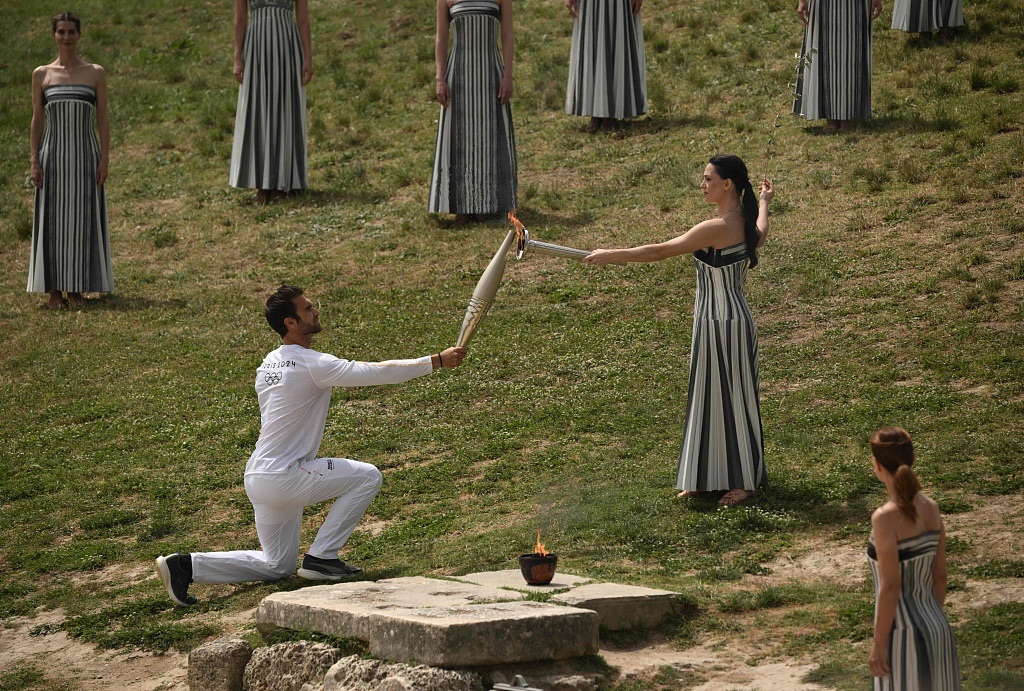 'Paris Time' begins as first Olympic torch lit for 2024 Olympic Games