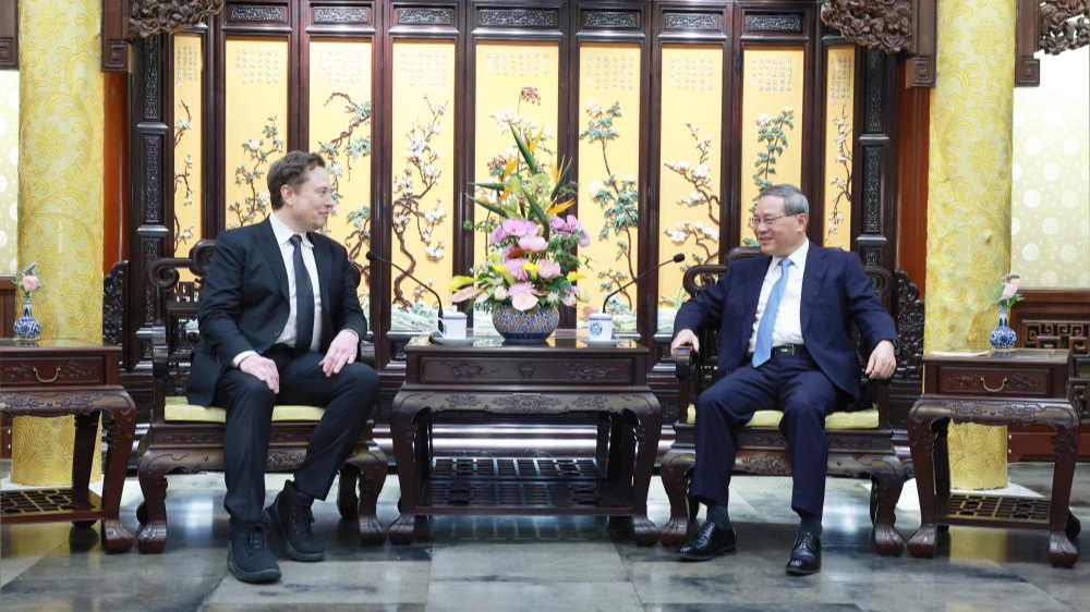Li Qiang Meets  Musk: China's huge market always open to foreign firms
