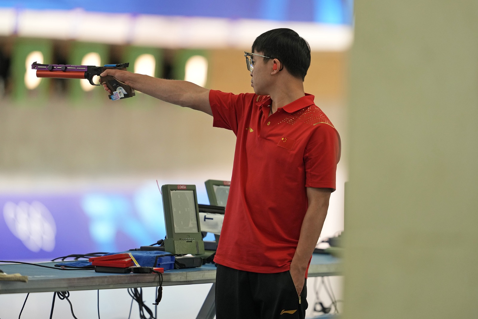 Xie Yu adds 3rd gold for China at Paris Games in 10-meter air pistol
