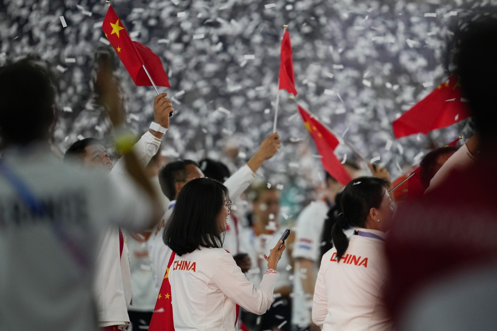 Chinese authorities congratulate athletes on their  best performance at an overseas Olympic Games