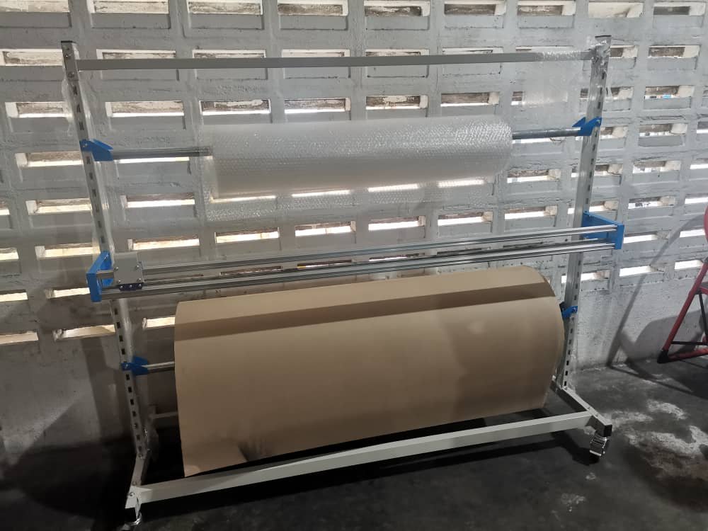 PACKAGING MATERIALS DISPENSER