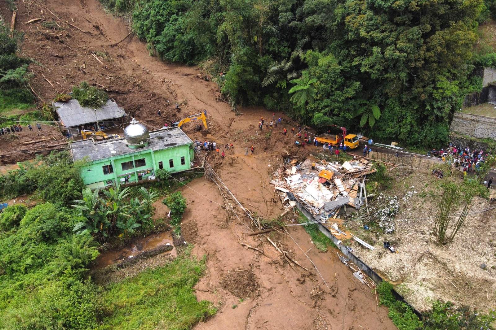 Landslide and flash floods hit Indonesia's Sumatra island, leaving 16 dead and 6 missing