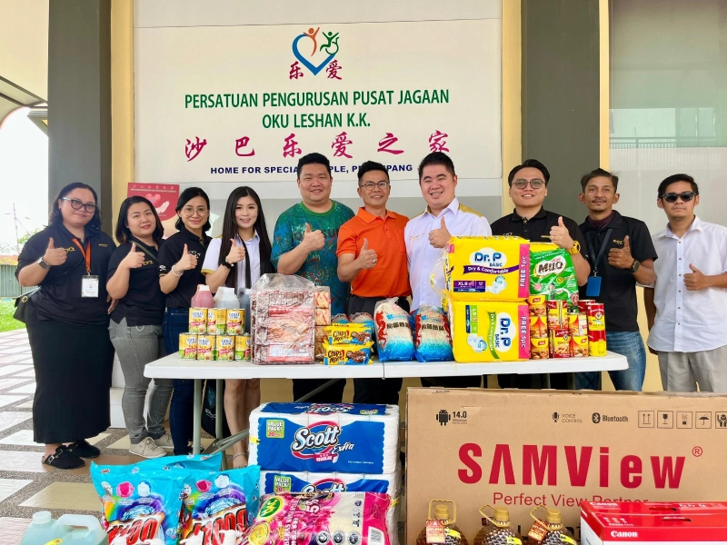 Donations and Visits at OKU Leshan