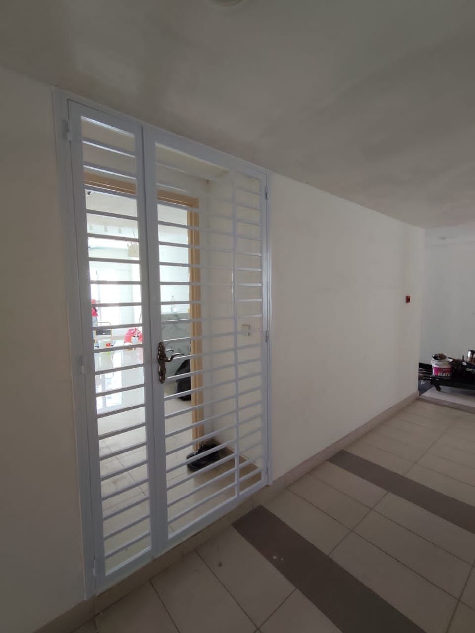 Tropez Residences Grille Door