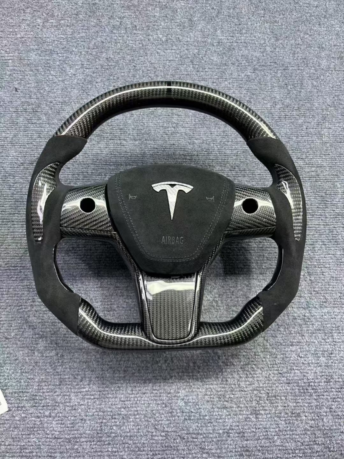 Tesla Carbon fibre steering wheel