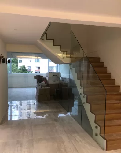 Sleek and Sturdy Glass Railing for a Modern and Elegant Condominium