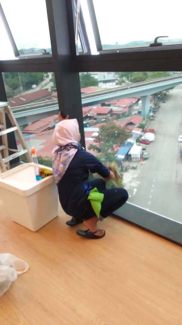 Cleaning and Wiping Window Glass at Client Office at Kota Damansara