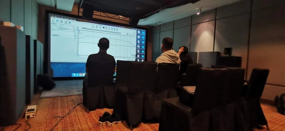 Audio Expert Team Calibrating The Sound System | Private Home Cinema Singapore