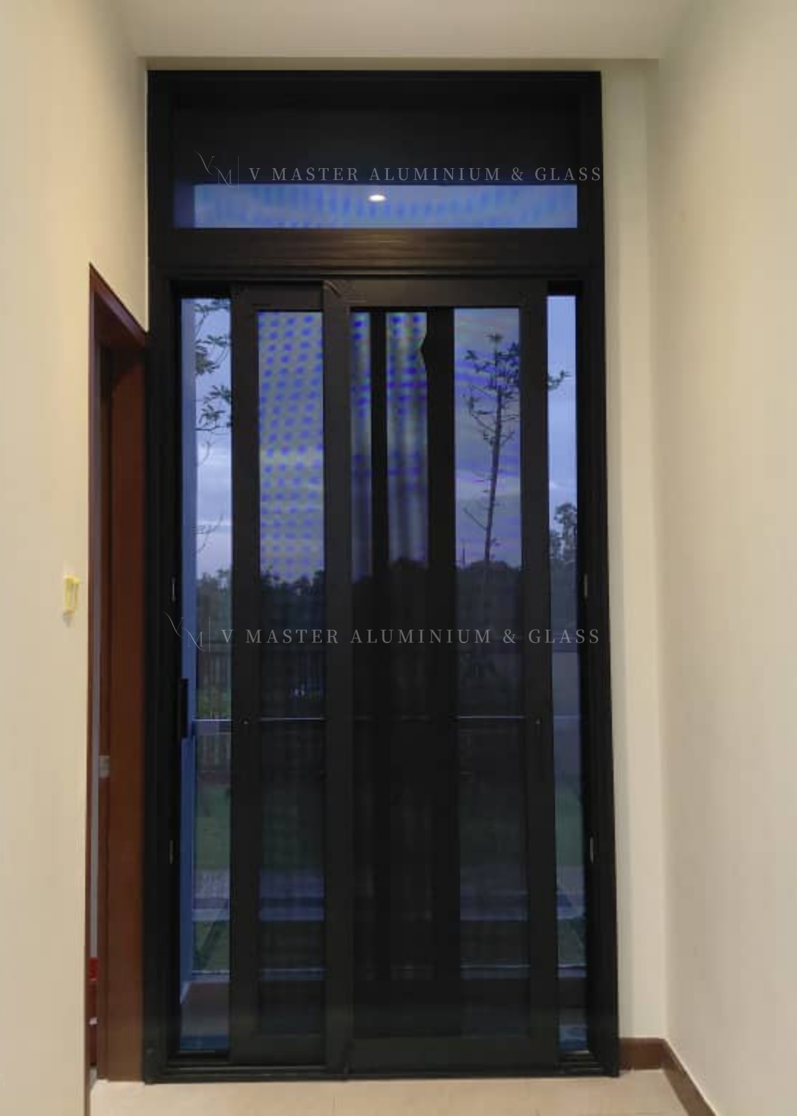 MASTER SERIES SLIDING MESH DOOR AT AURORA SENTRAL