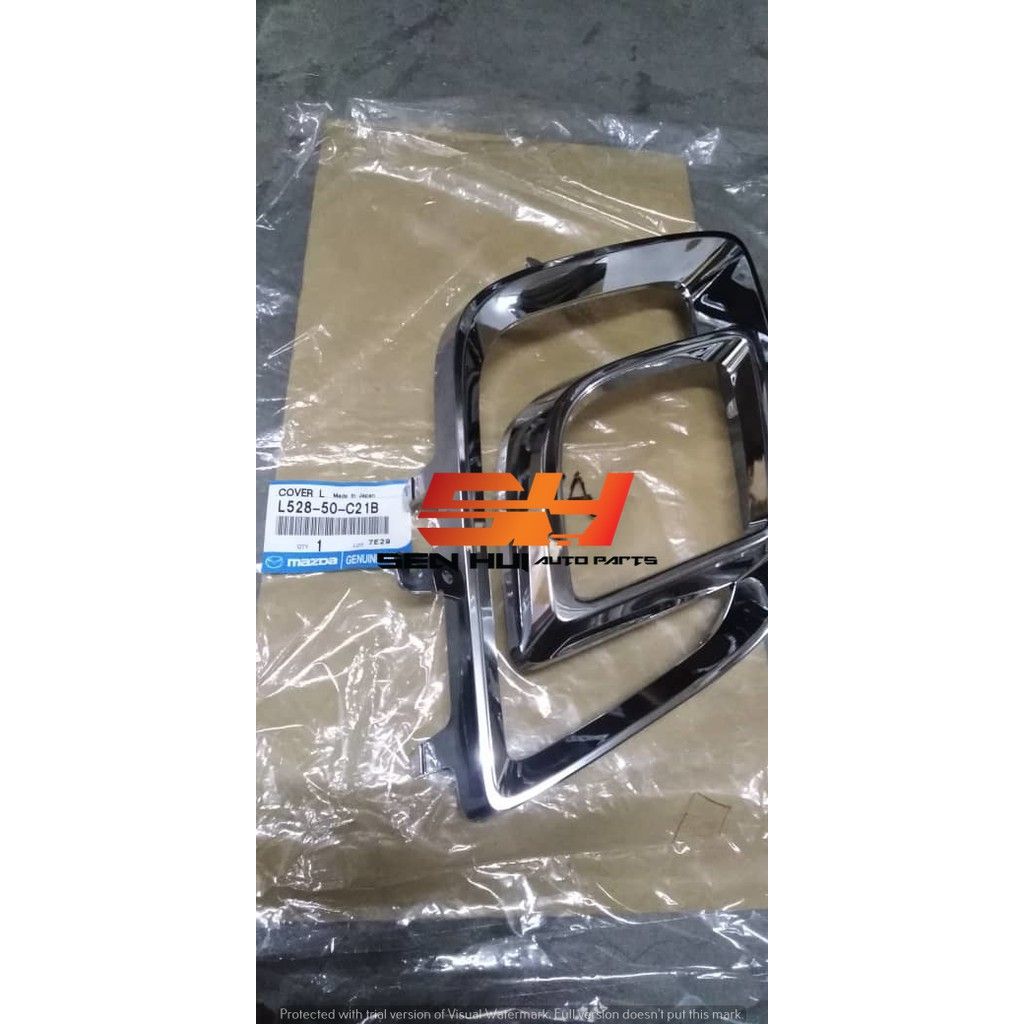 Mazda 8 Fog Lamp Cover Outer LH L52850C21B Genuine Part
