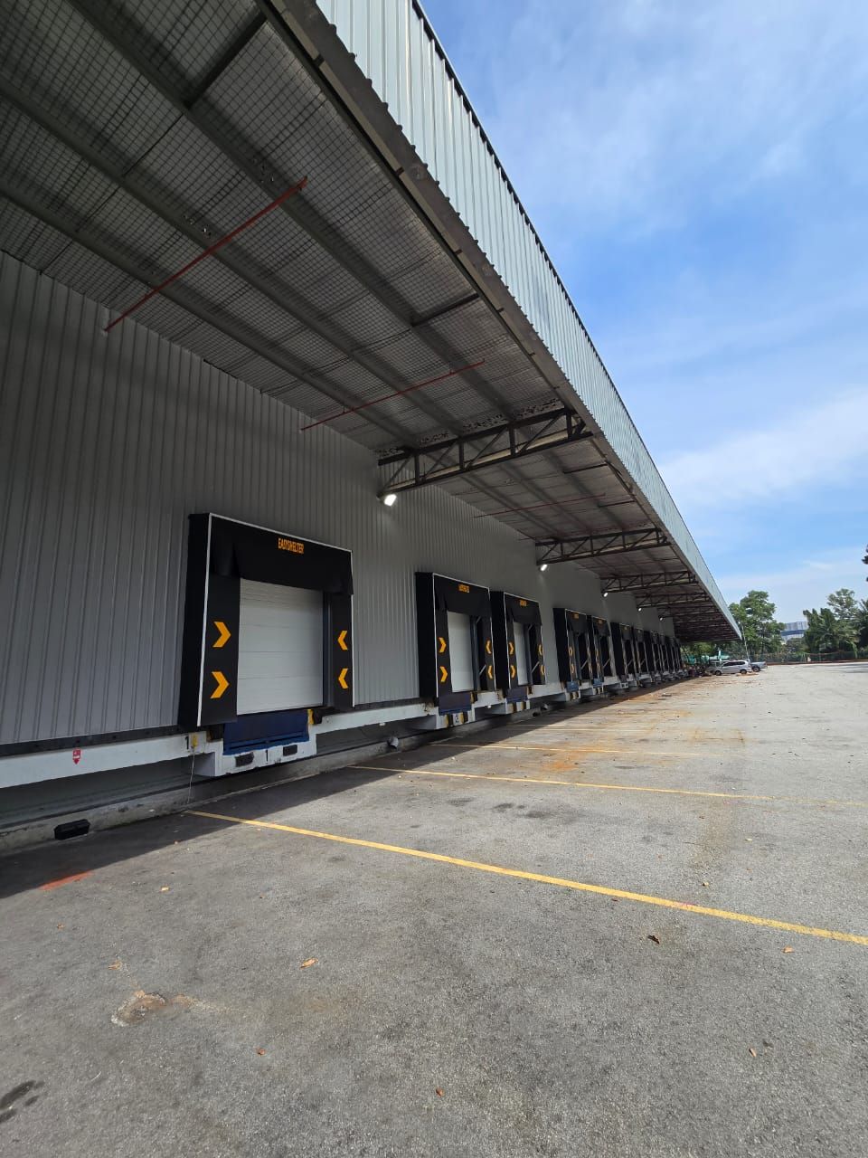 Industrial Wall Cladding with Roller Shutter Structure | Custom Steel Cladding & Heavy-Duty Shutter System Malaysia
