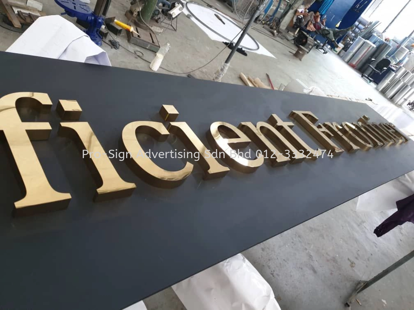 GOLD STAINLESS STEEL BOX UP LETTERING (EFFICIENT FRONTIER, PJ, 2019)