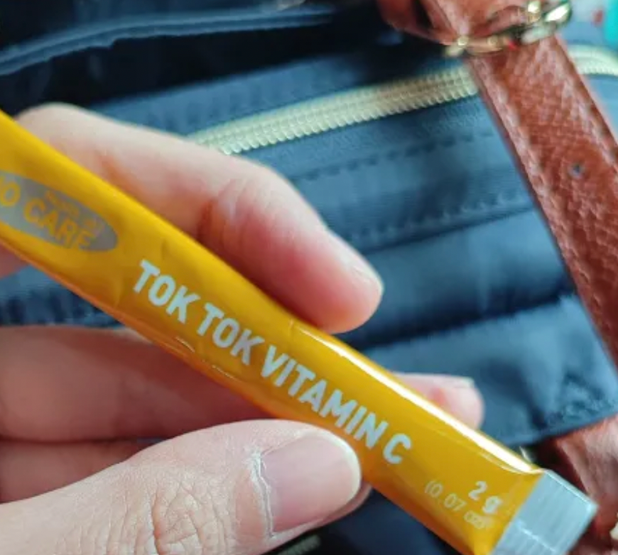 Tok Tok Vitamin C's Logo