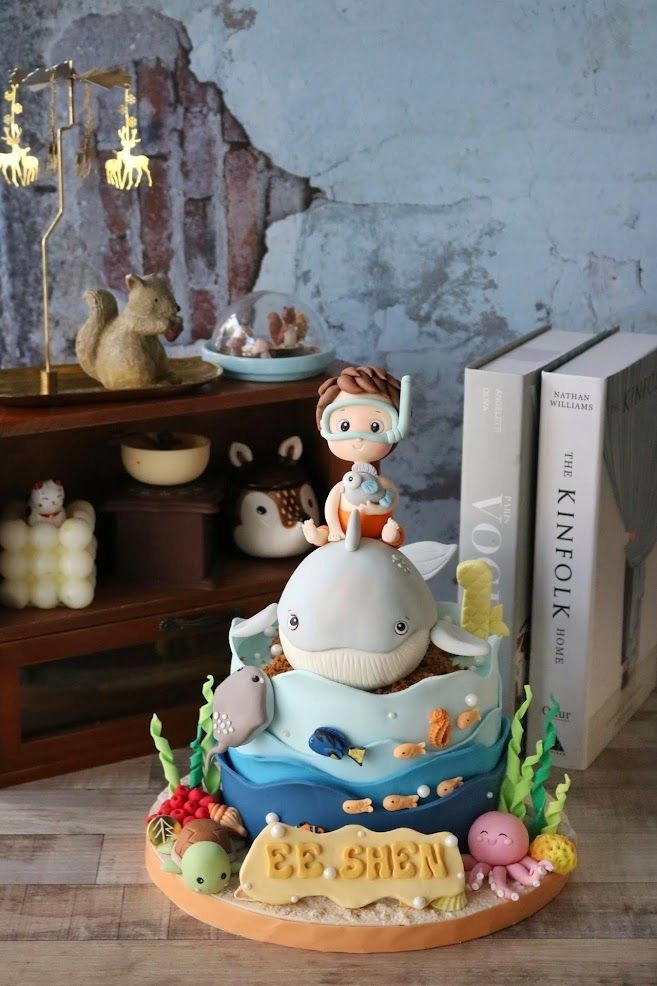 Baby on Whale Cake
