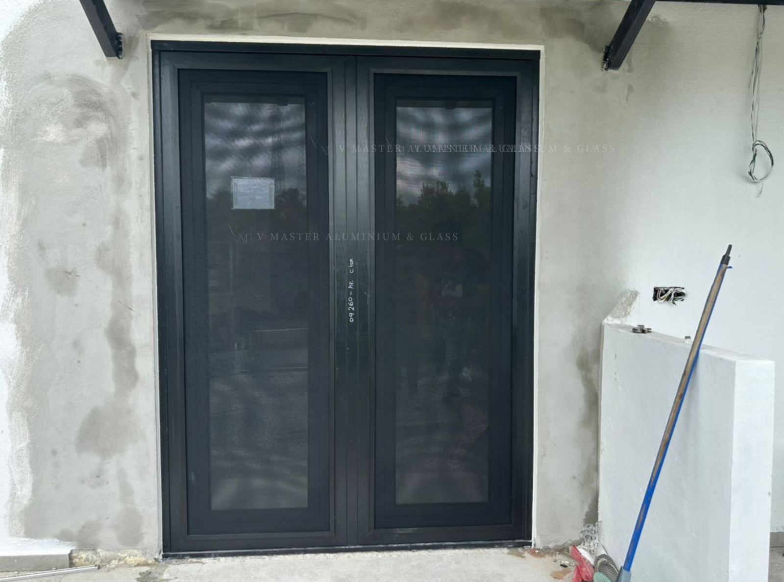 MASTER FOLDING DOOR IN DOOR AT TAMAN NUSANTARA