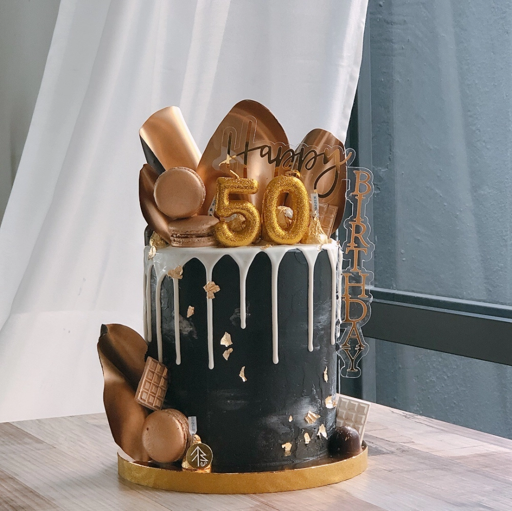 Black Gold Drip Cake