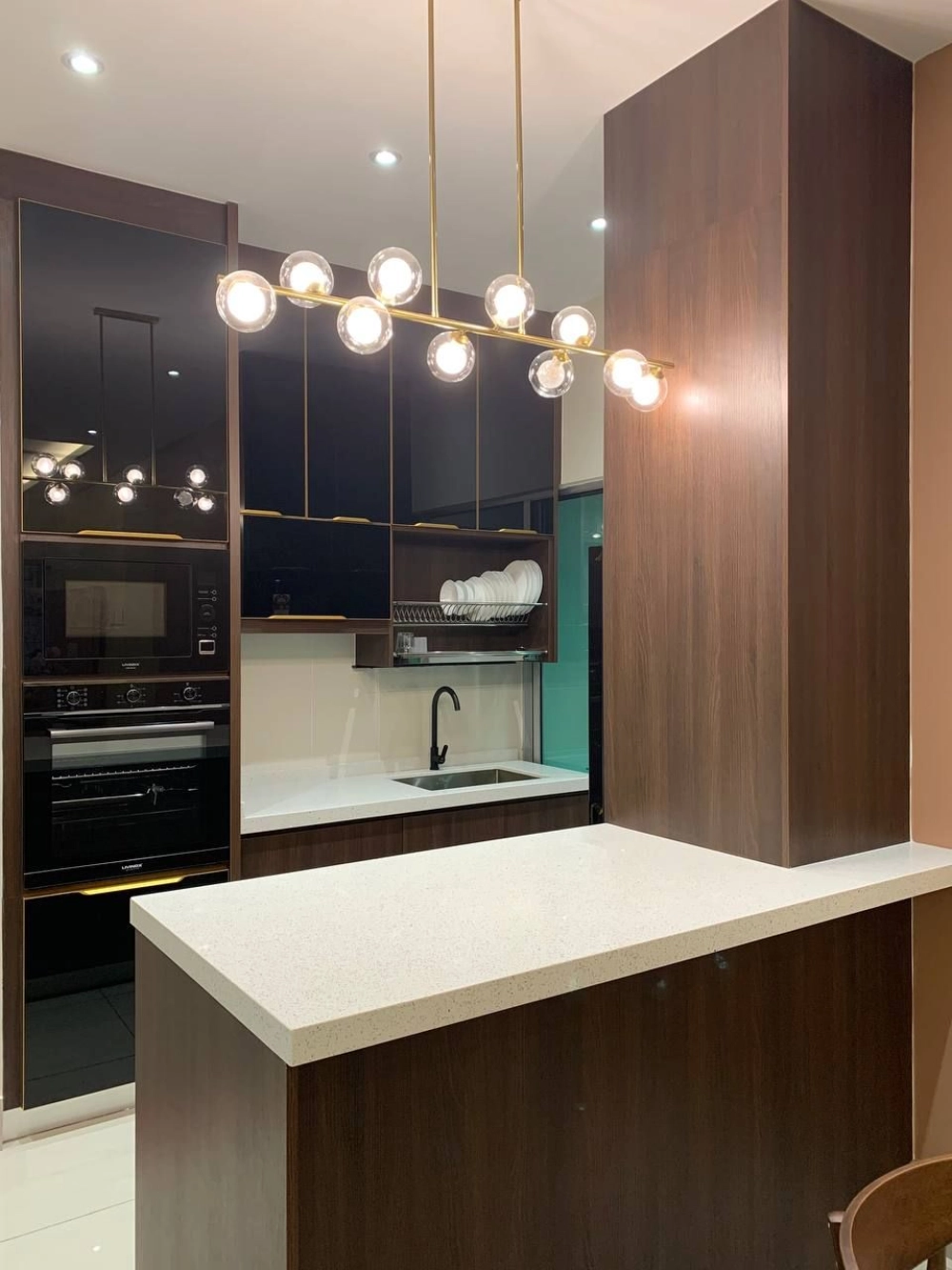 Built in kitchen cabinet design for Malaysian home