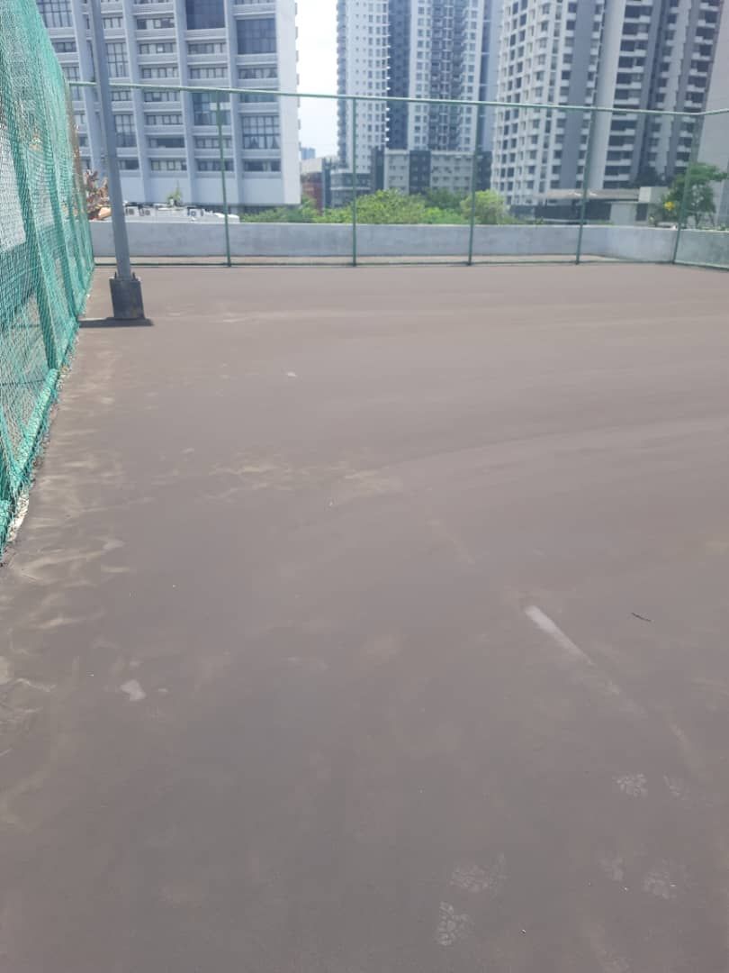 Two Layers Of Bitumen Mastic Base Cushioning Coats Completed And Pending To Dry
