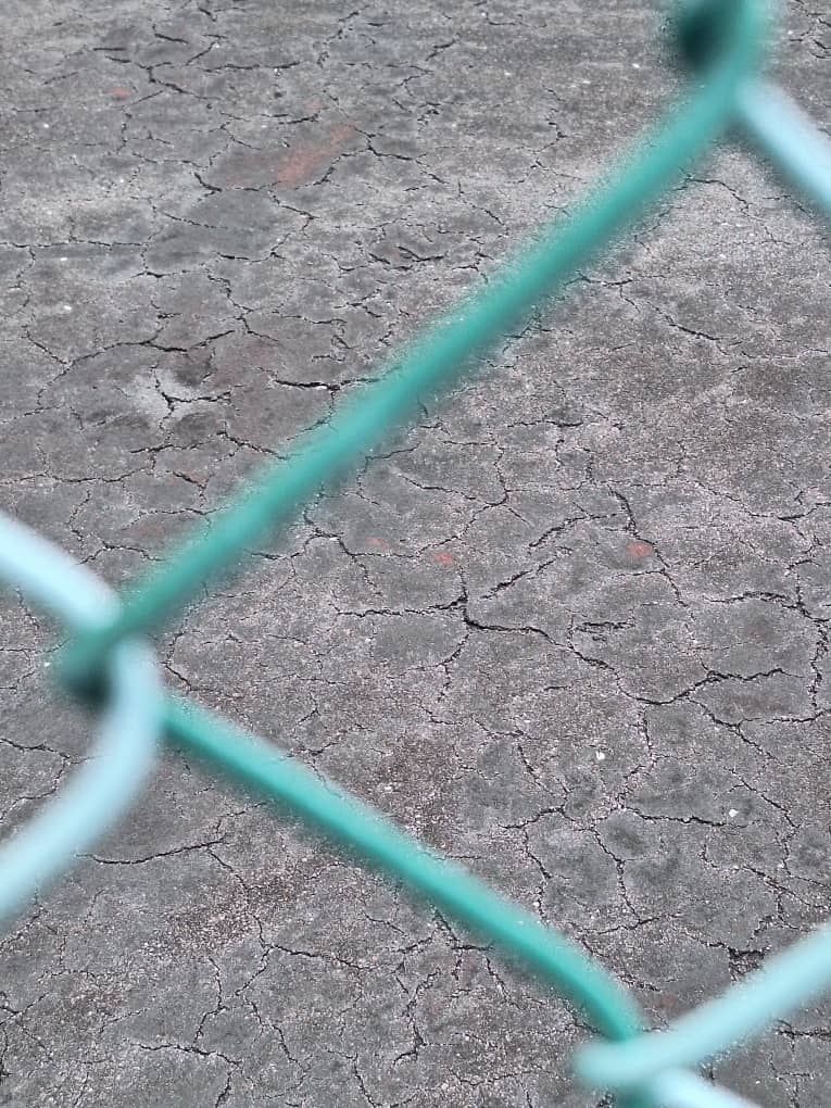 Condition Of Existing Tennis Court Before Resurfacing