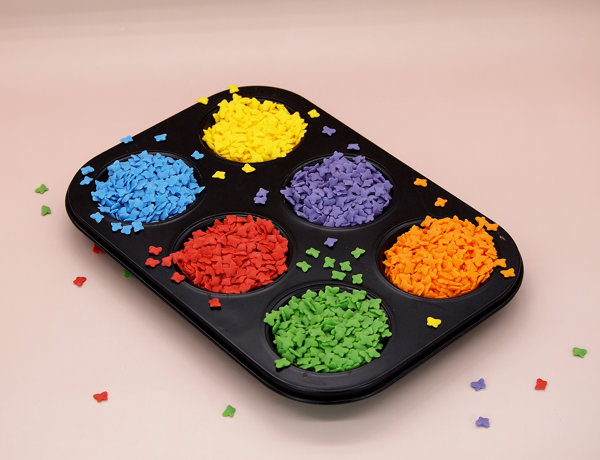 Elegant butterfly shaped confetti sprinkles for spring and wedding bakery themes