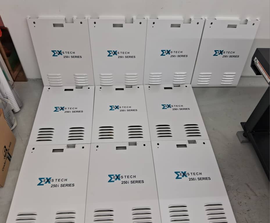 UV printing on machine enclosure panel with sharp logo and text